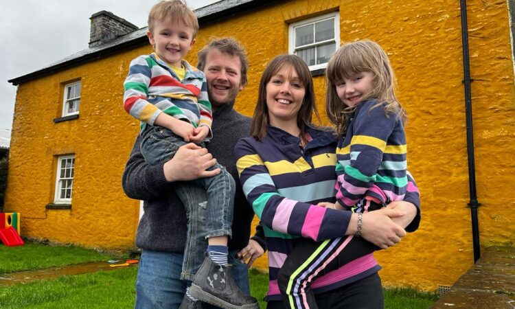 Meinir and Gary Howells with their children